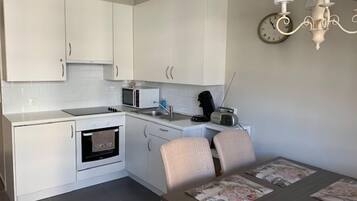 Apartment | Private kitchen | Fridge, microwave, stovetop, coffee/tea maker