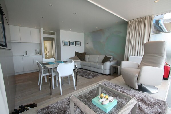 Apartment, 1 Bedroom | Living area | Flat-screen TV