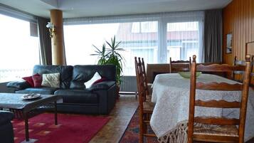 Apartment, Sea View | Living room | TV