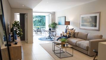 Apartamento exclusivo | Área de estar | TV de tela plana