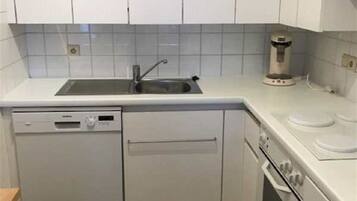 Apartment, Sea View | Private kitchen | Full-sized fridge, microwave, oven, stovetop