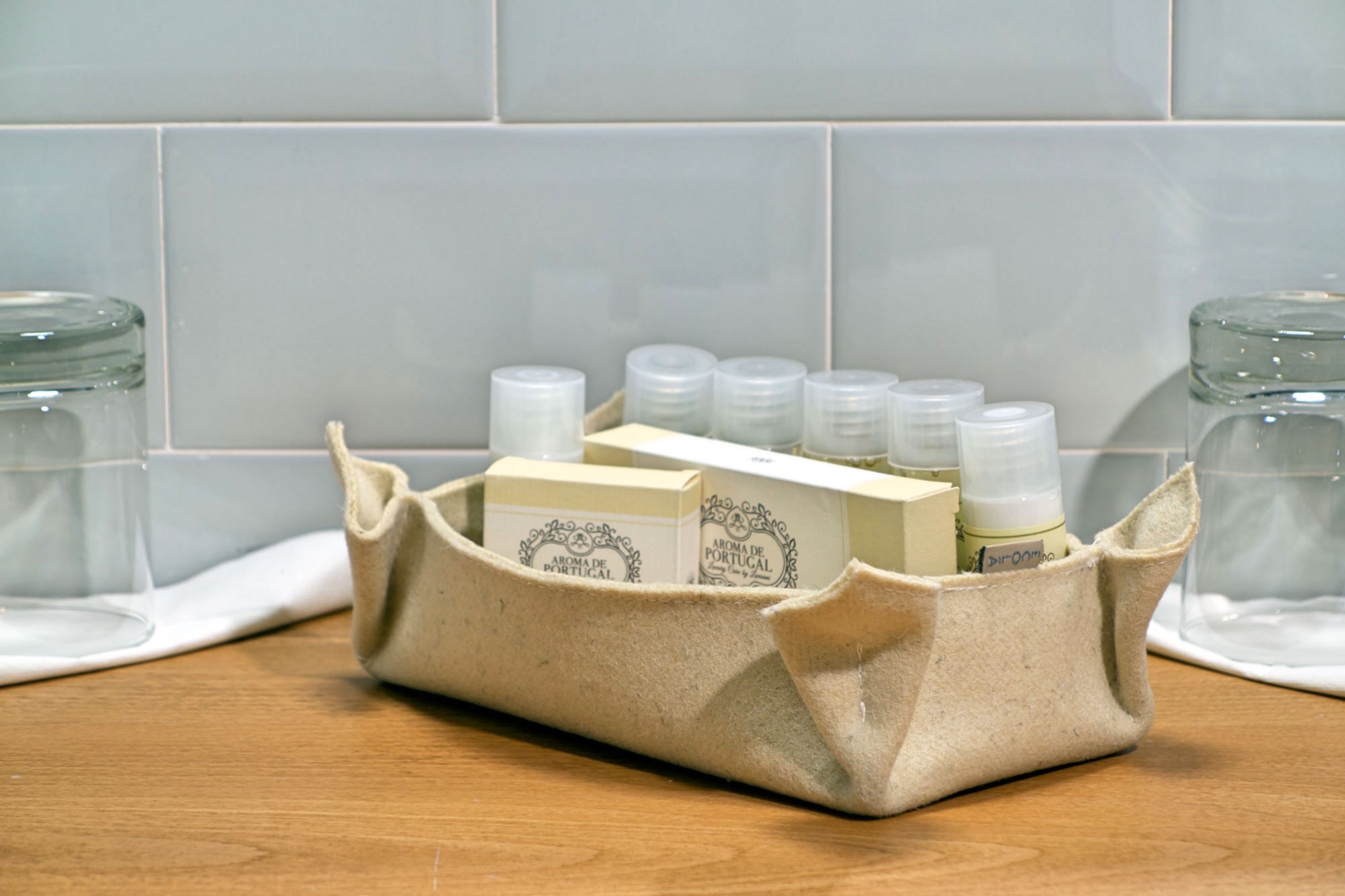 designer toiletries, hair dryer, bathrobes, slippers