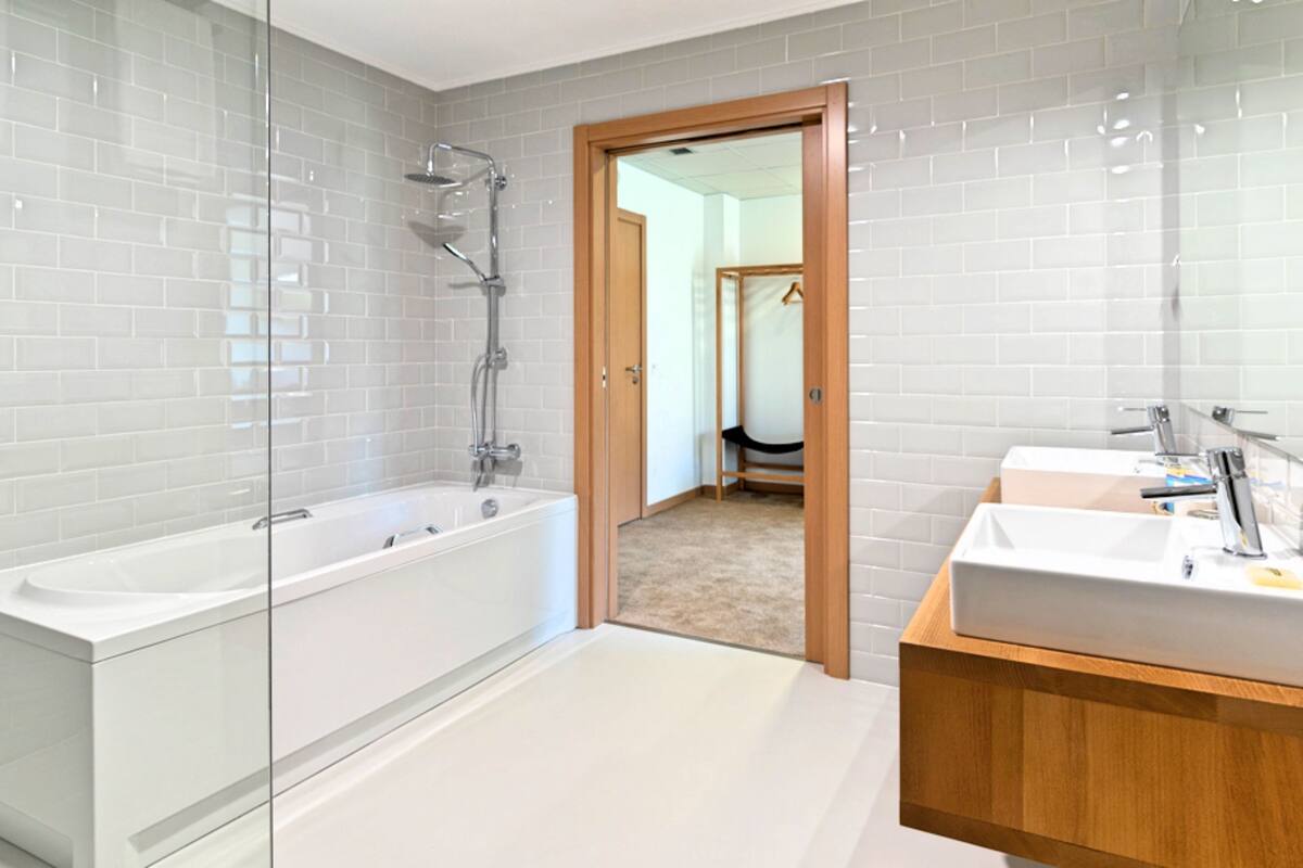 junior suite (ecola) | bathroom | designer toiletries, hair dryer, bathrobes, slippers