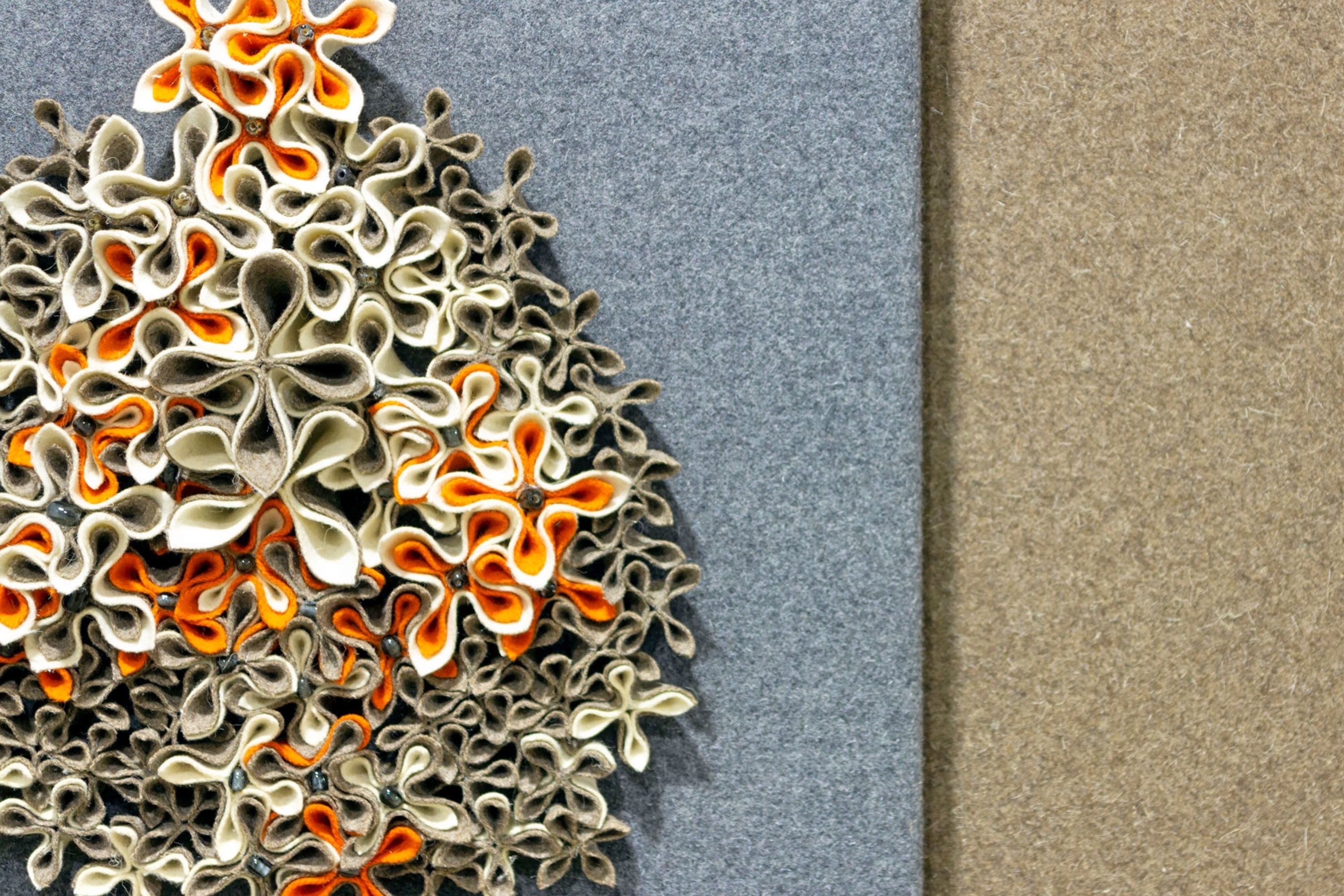 A close-up of a textured surface with a complex, organic pattern.