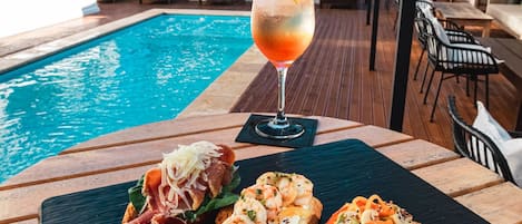 Seasonal outdoor pool, pool umbrellas, sun loungers