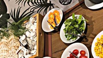 Daily buffet breakfast (USD 25 per person)