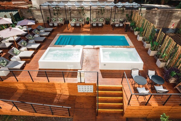 Seasonal outdoor pool, pool umbrellas, pool loungers