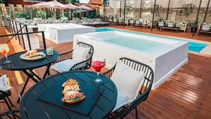 Seasonal outdoor pool, pool umbrellas, sun loungers