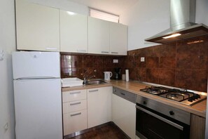 Fridge, coffee/tea maker, cookware/dishes/utensils, dining tables - Apartment Grskovic G. Setaliste A4 (Silo - island Krk)