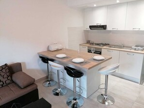 Fridge, coffee/tea maker, cookware/dishes/utensils, dining tables - Apartment Grskovic G. Setaliste A2 (Silo - island Krk)