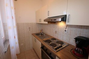 Fridge, coffee/tea maker, cookware/dishes/utensils, dining tables - Apartment Dudovic Damir A2 nr 2 (Silo - island Krk)
