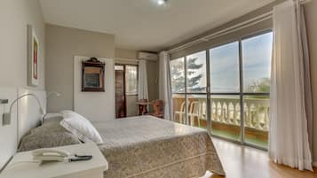 Triple Room, Beach View, Beachfront | 1 bedroom, minibar, blackout drapes, free WiFi