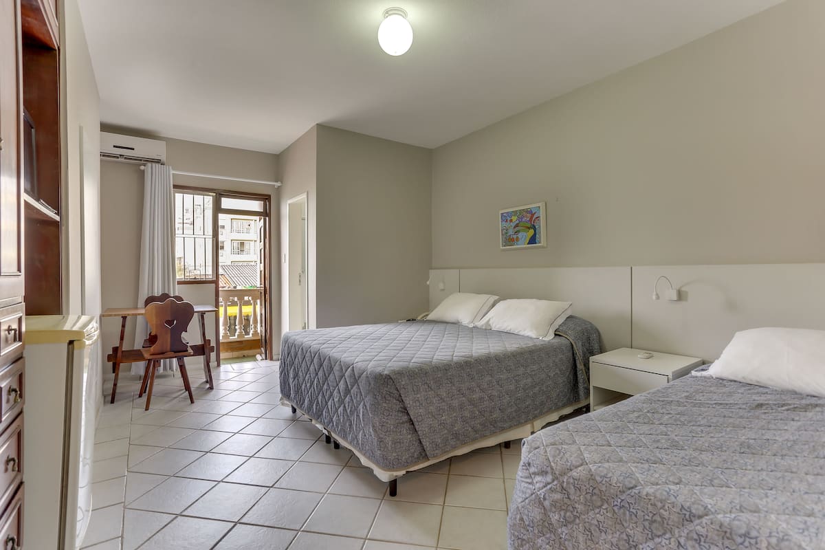 Basic Quadruple Room, Partial Ocean View, Corner | 1 bedroom, minibar, blackout drapes, free WiFi