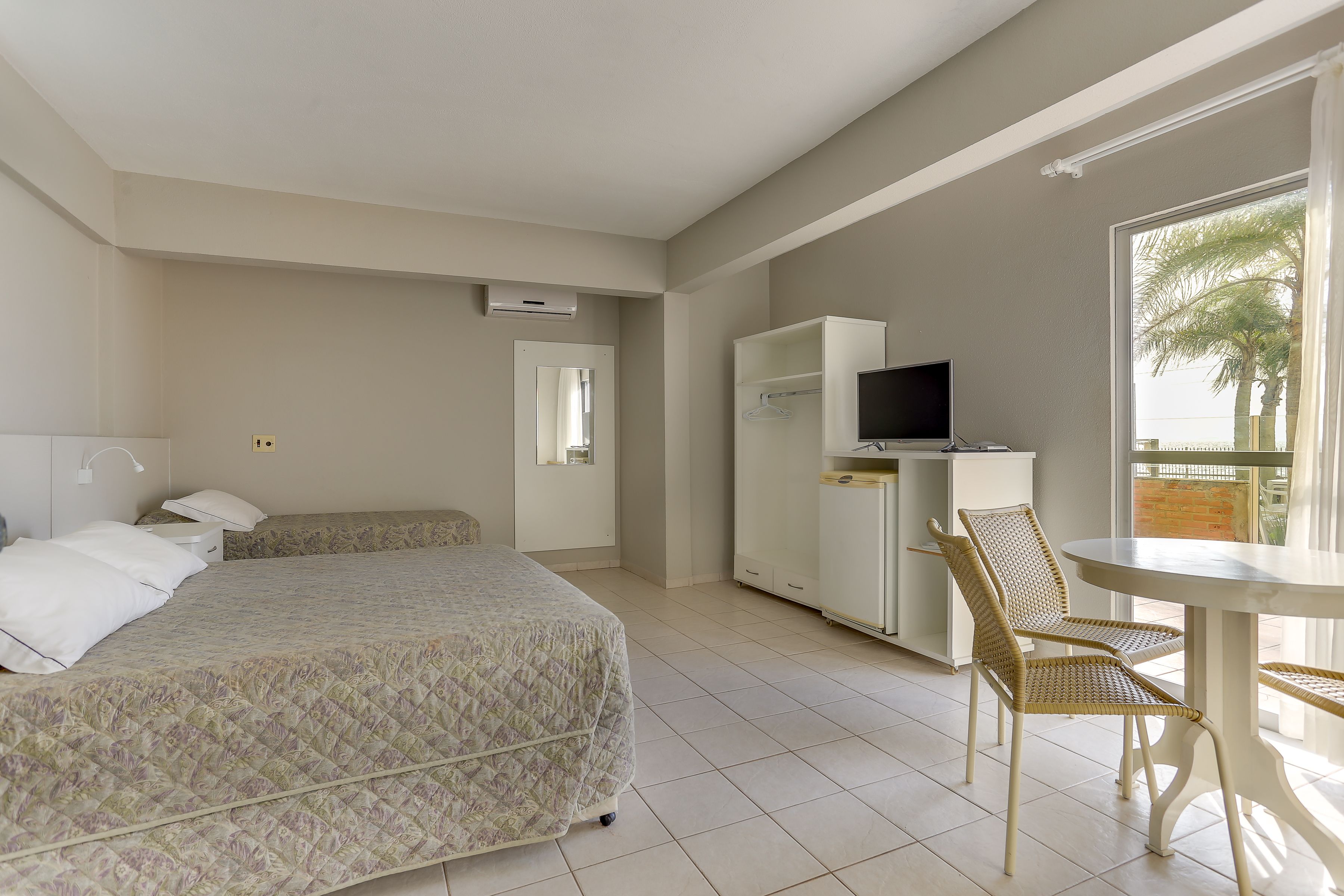 basic quadruple room, beach view, beachfront | 1 bedroom, minibar, blackout curtains, free wifi