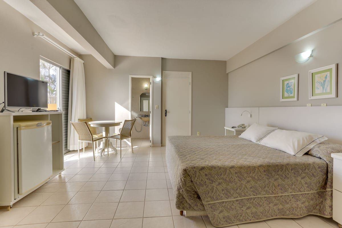 Basic Quadruple Room, Beach View, Beachfront | Minibar, blackout curtains, free WiFi, bed sheets