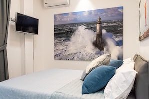 Familienzimmer, Stadtblick | Hochwertige Bettwaren, Daunenbettdecken, Pillowtop-Betten, Zimmersafe