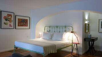 Premium bedding, down comforters, memory foam beds, minibar