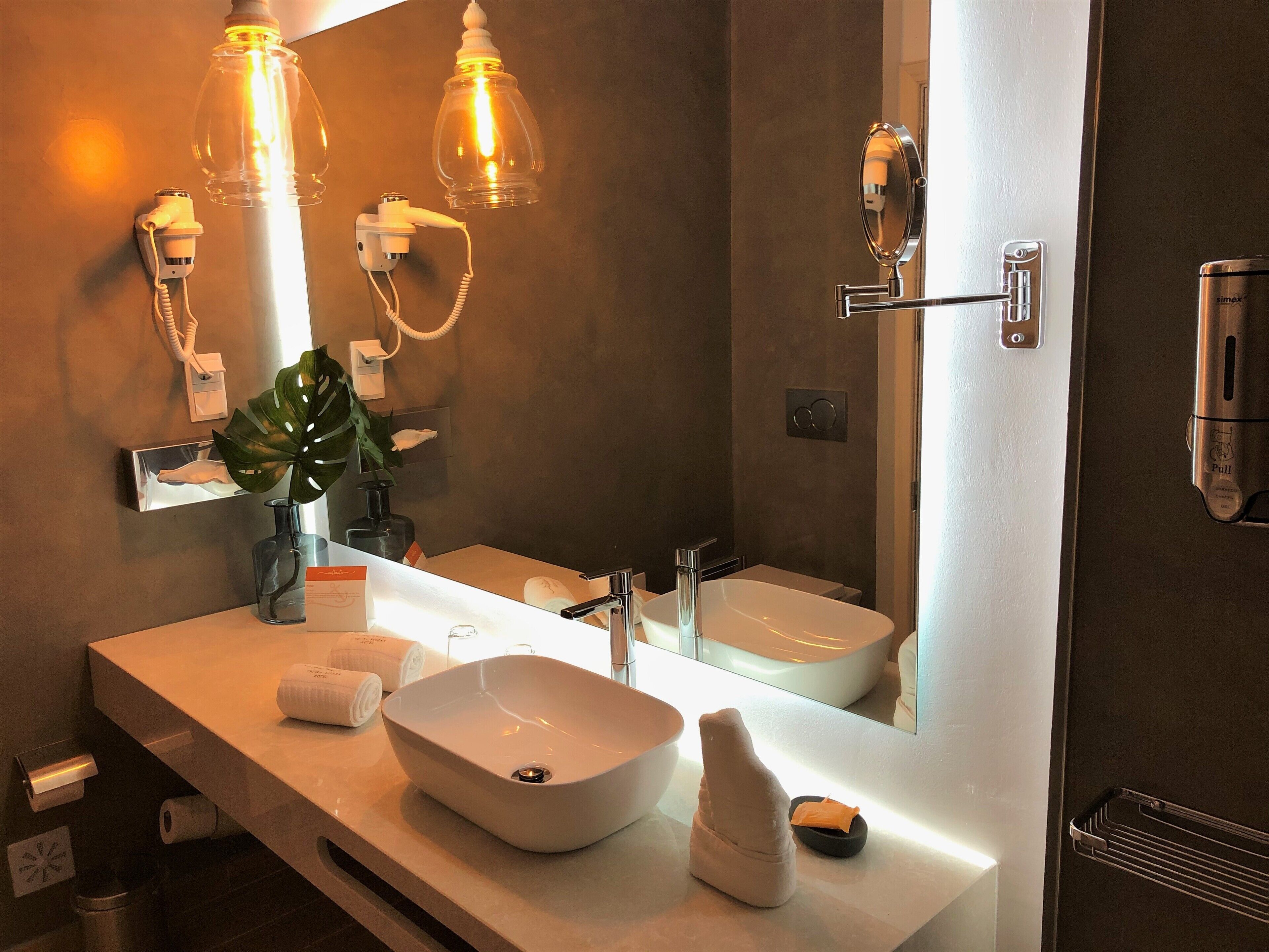 classic twin room, city view | bathroom | shower, hair dryer, towels, soap