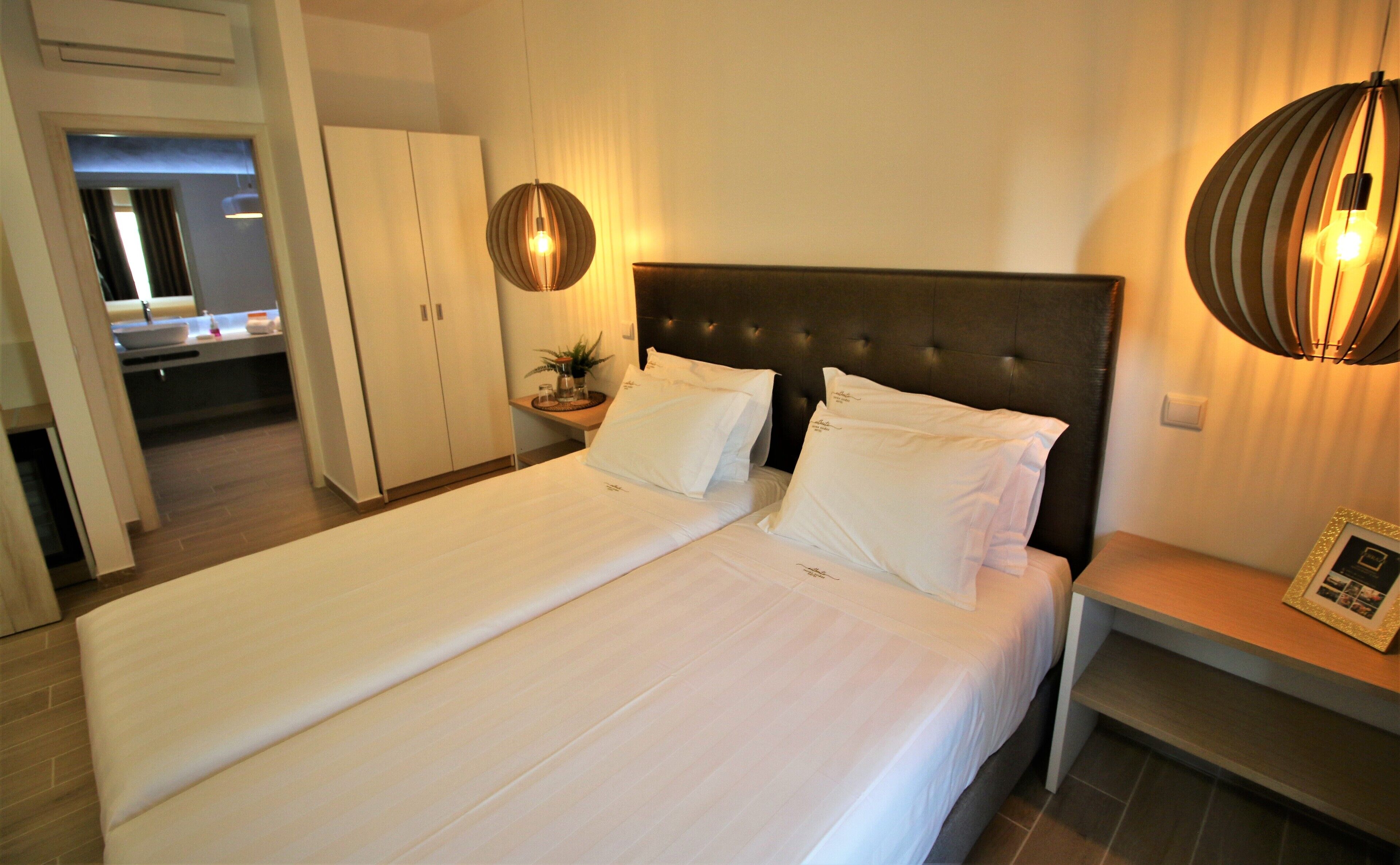 classic twin room, city view | 1 bedroom, minibar, in-room safe, blackout curtains