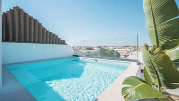 Outdoor pool, open 9:00 AM to 9:00 PM, sun loungers