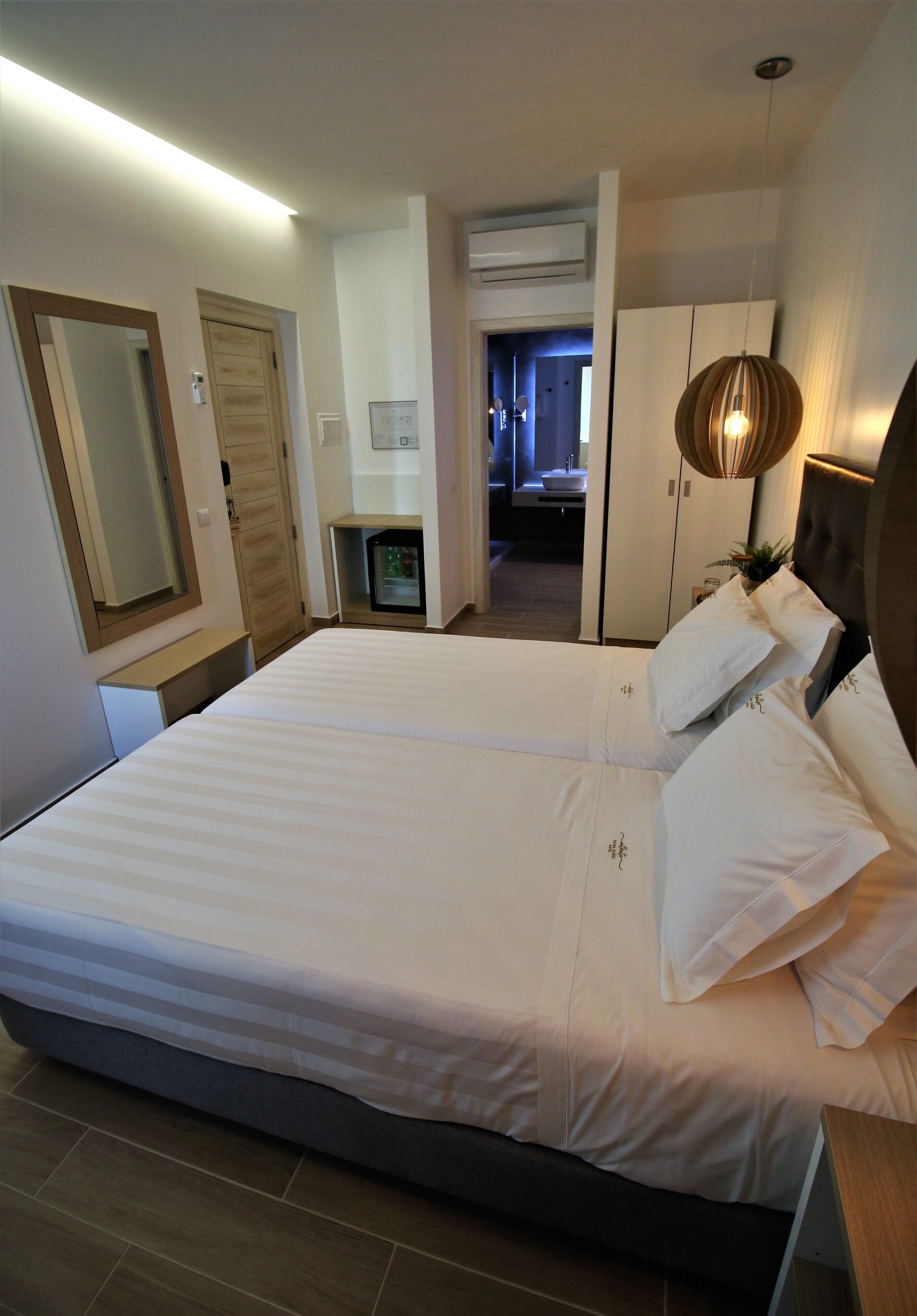 classic twin room, city view | 1 bedroom, minibar, in-room safe, blackout curtains