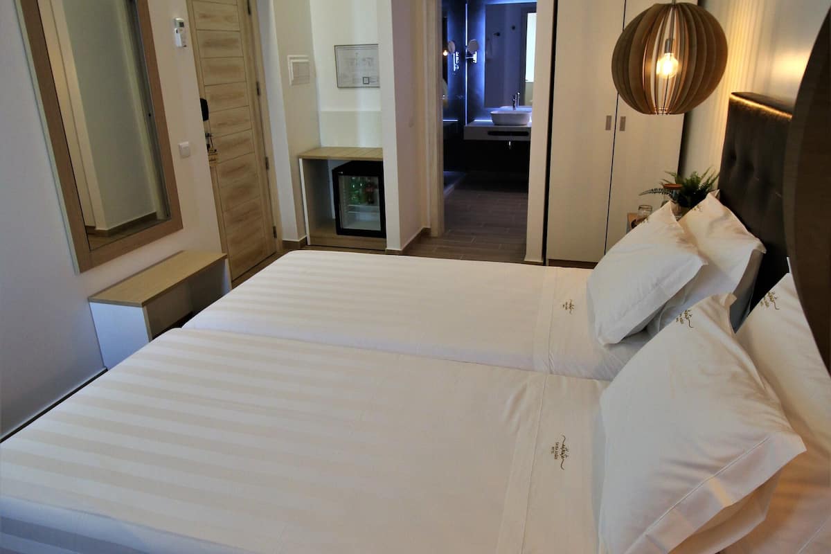 classic twin room, city view | 1 bedroom, minibar, in-room safe, blackout curtains