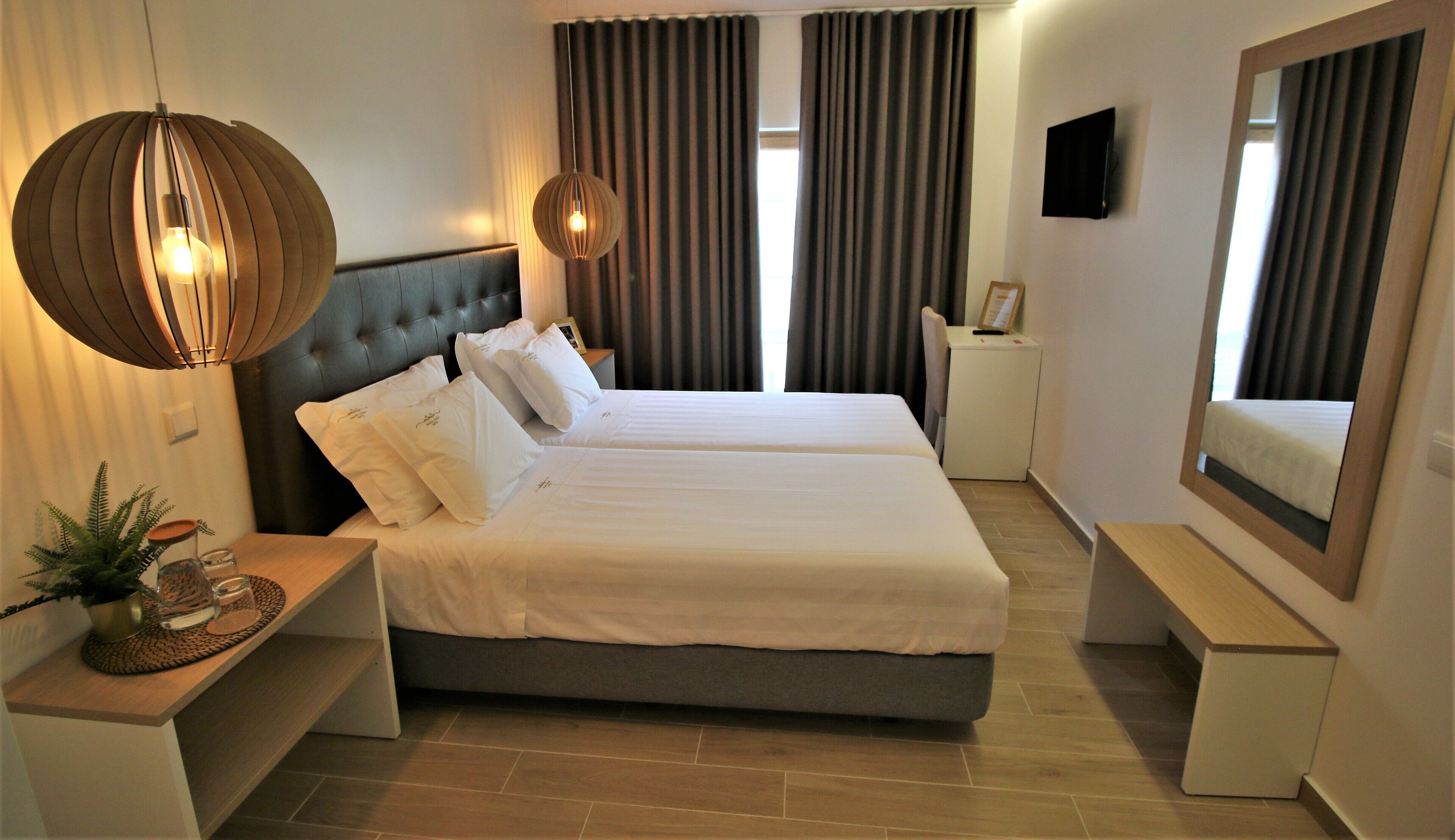 classic twin room, city view | 1 bedroom, minibar, in-room safe, blackout curtains
