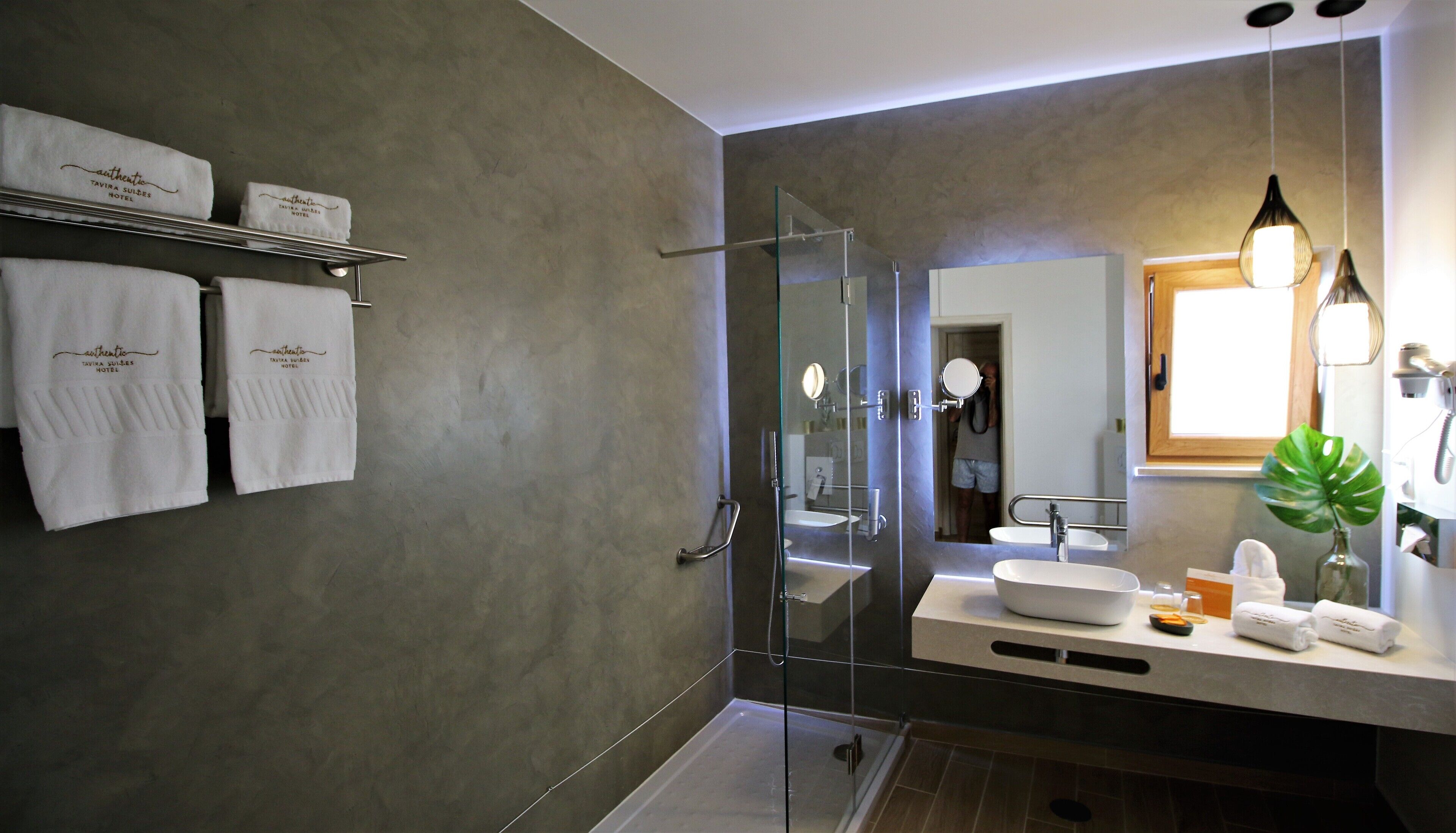 family room, city view | bathroom | shower, hair dryer, towels, soap