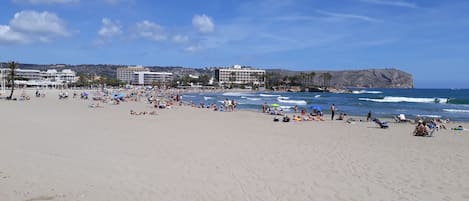 On the beach, beach towels