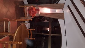 A room with a bed, a chair, a window, and a door. - Love 2 bed apartment.  Sleeps 4 with wifi, satellite TV and pool. (Xàbia)