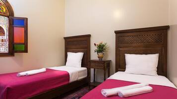 Blackout drapes, free WiFi, bed sheets