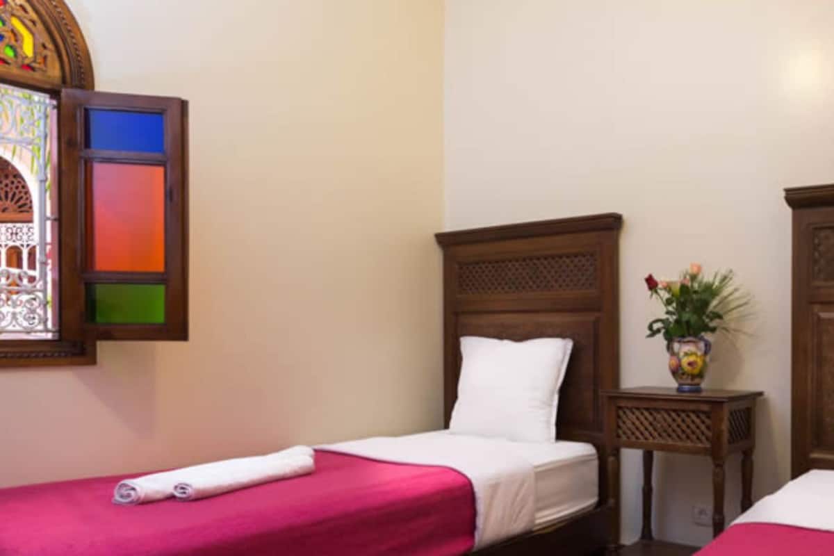 Triple Room, Shared Bathroom (A/C) | Blackout drapes, free WiFi, bed sheets
