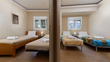 3 habitaciones, tabla de planchar con plancha, wifi y ropa de cama