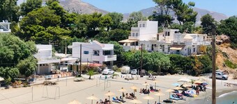 Modern Beach Front Condo in South Crete