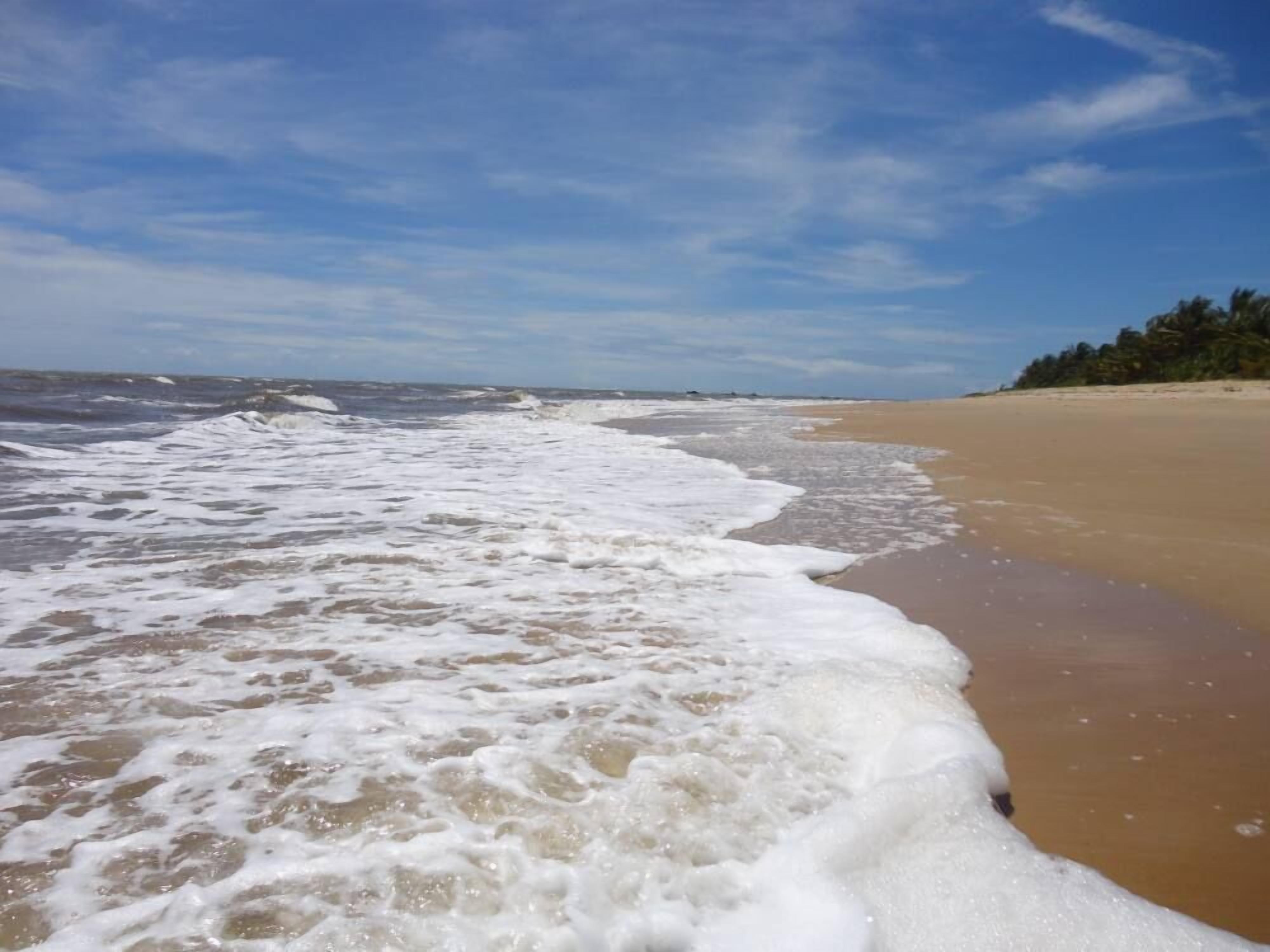 Nära stranden, solstolar och strandhanddukar