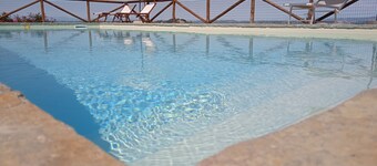 Appartamento piano terra con giardino , vista panoramica nel cuore della Toscana