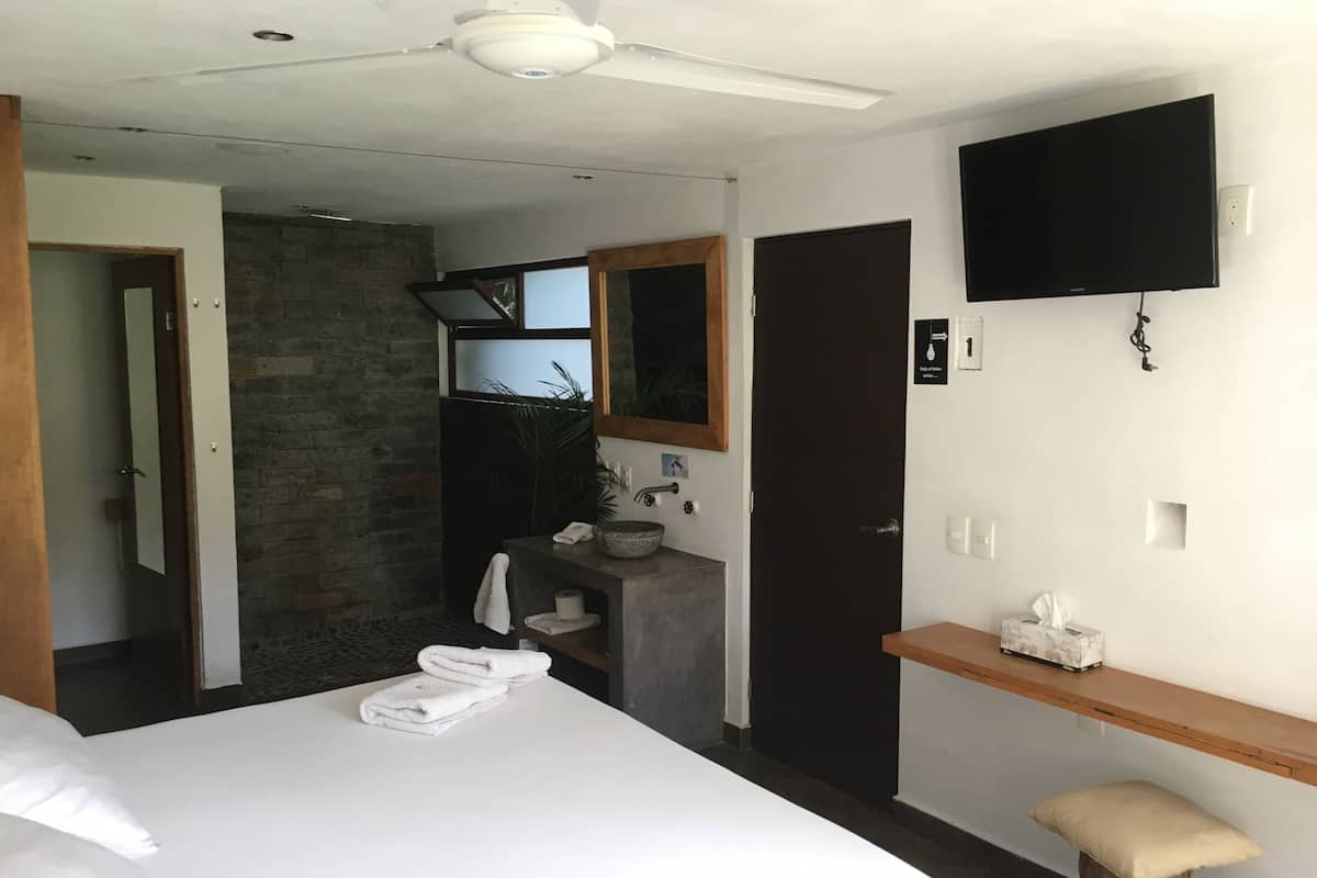 Luxe beddengoed, een kluis op de kamer, verduisterende gordijnen