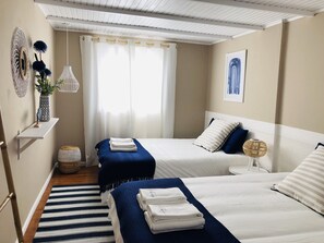 2 habitaciones, tabla de planchar con plancha, cuna de viaje y wifi