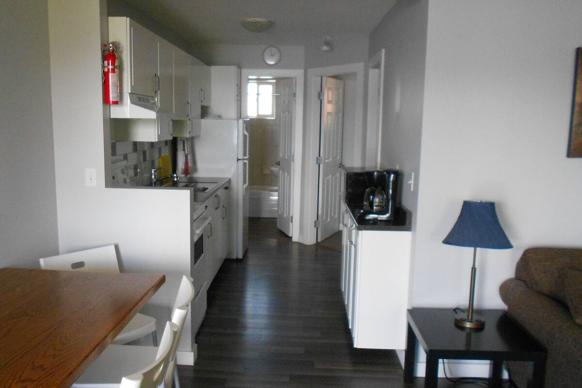 Suite, 2 Queen Beds, Lake View | Living area