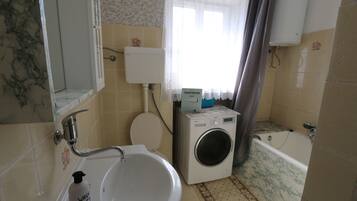 Bañera y secador de pelo