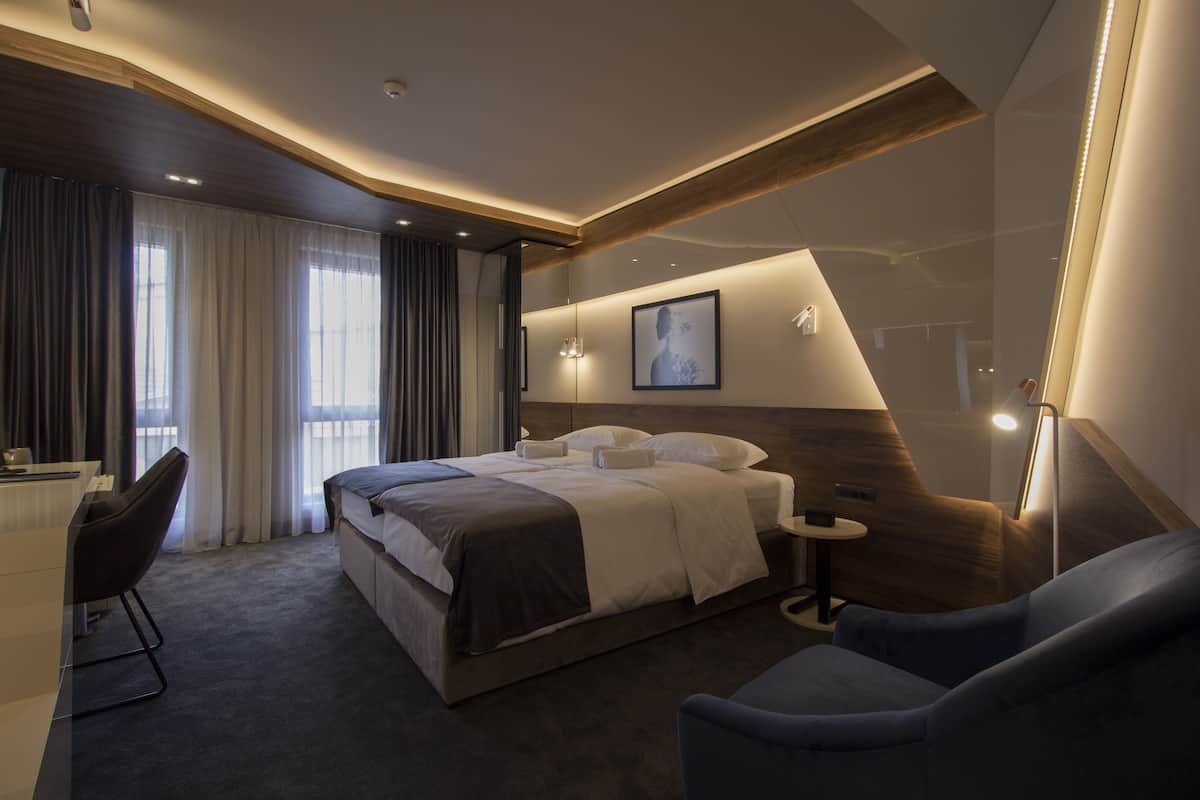 Deluxe Double or Twin Room, Balcony | Frette Italian sheets, premium bedding, pillow-top beds, minibar