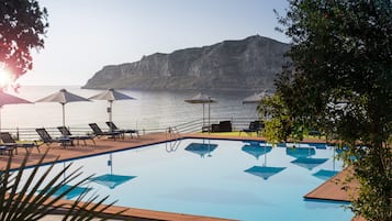 Outdoor pool, open 10:00 AM to 8:00 PM, pool umbrellas, sun loungers