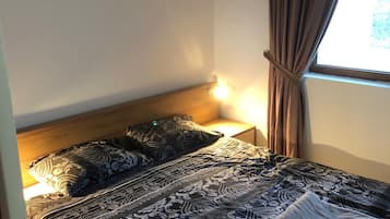 2 slaapkamers, een strijkplank/strijkijzer, gratis wifi, beddengoed