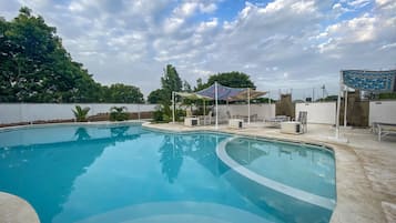 Outdoor pool, open 9:00 AM to 7:00 PM, pool umbrellas, sun loungers