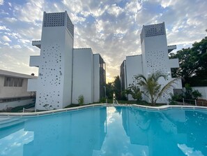 Outdoor pool, open 9:00 AM to 7:00 PM, pool umbrellas, pool loungers - Aqua Resort (Diani Beach)