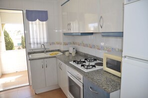 Fridge, oven, coffee/tea maker, toaster