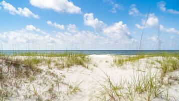 On the beach, sun loungers, beach towels