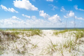 On the beach, sun loungers, beach towels