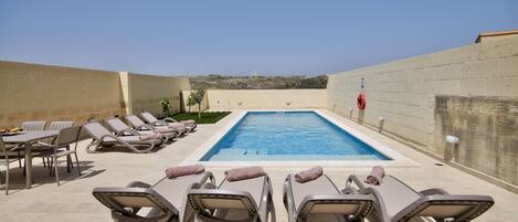 Outdoor pool, pool loungers