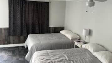 Standard Room, 2 Double Beds | 2 bedrooms, blackout curtains, free WiFi, bed sheets
